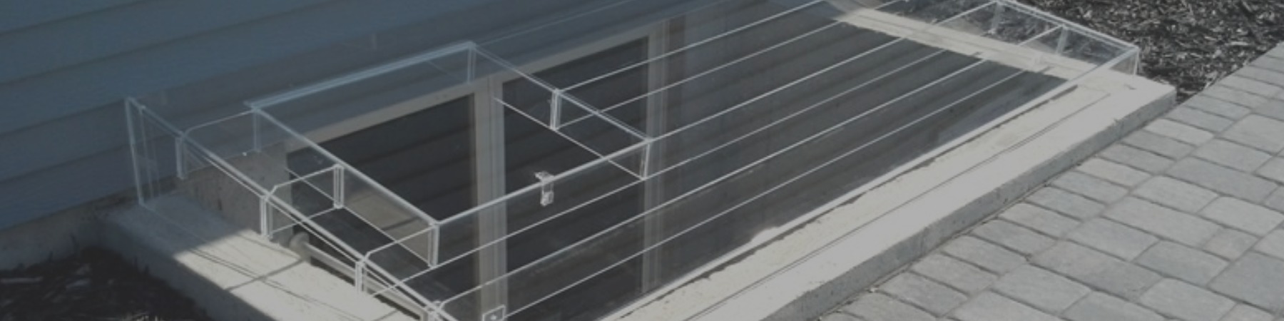 Acrylic Egress Window Well Covers made in Fargo, North Dakota by Custom Plastics